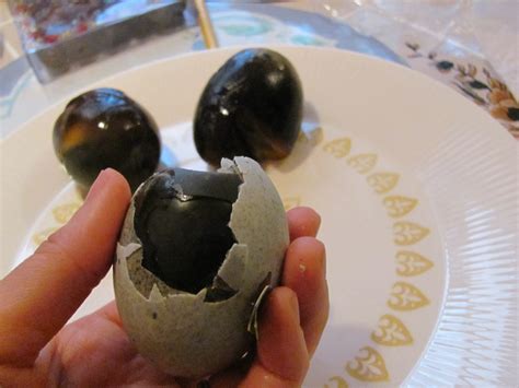 Century egg. A century egg sliced open. Alternative names. preserved egg, hundred-year egg, thousand-year egg, thousand-year-old egg, millennium egg, black egg, blacking egg, skin egg, old egg. Place of origin. Hunan, China. Main ingredients. Egg preserved in clay, ash, salt, quicklime, and rice hulls. Variations. 